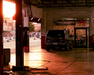 A car is parked in front of a building
