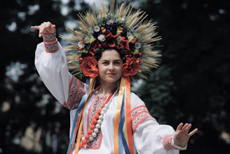 A woman in a costume with a wreath on her head