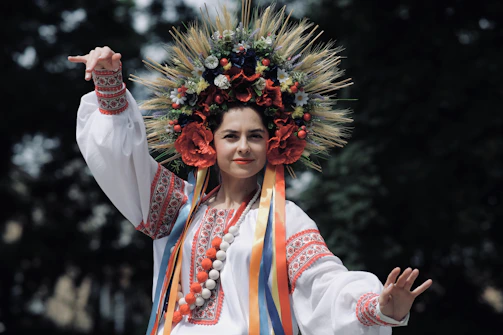 A woman in a costume with a wreath on her head