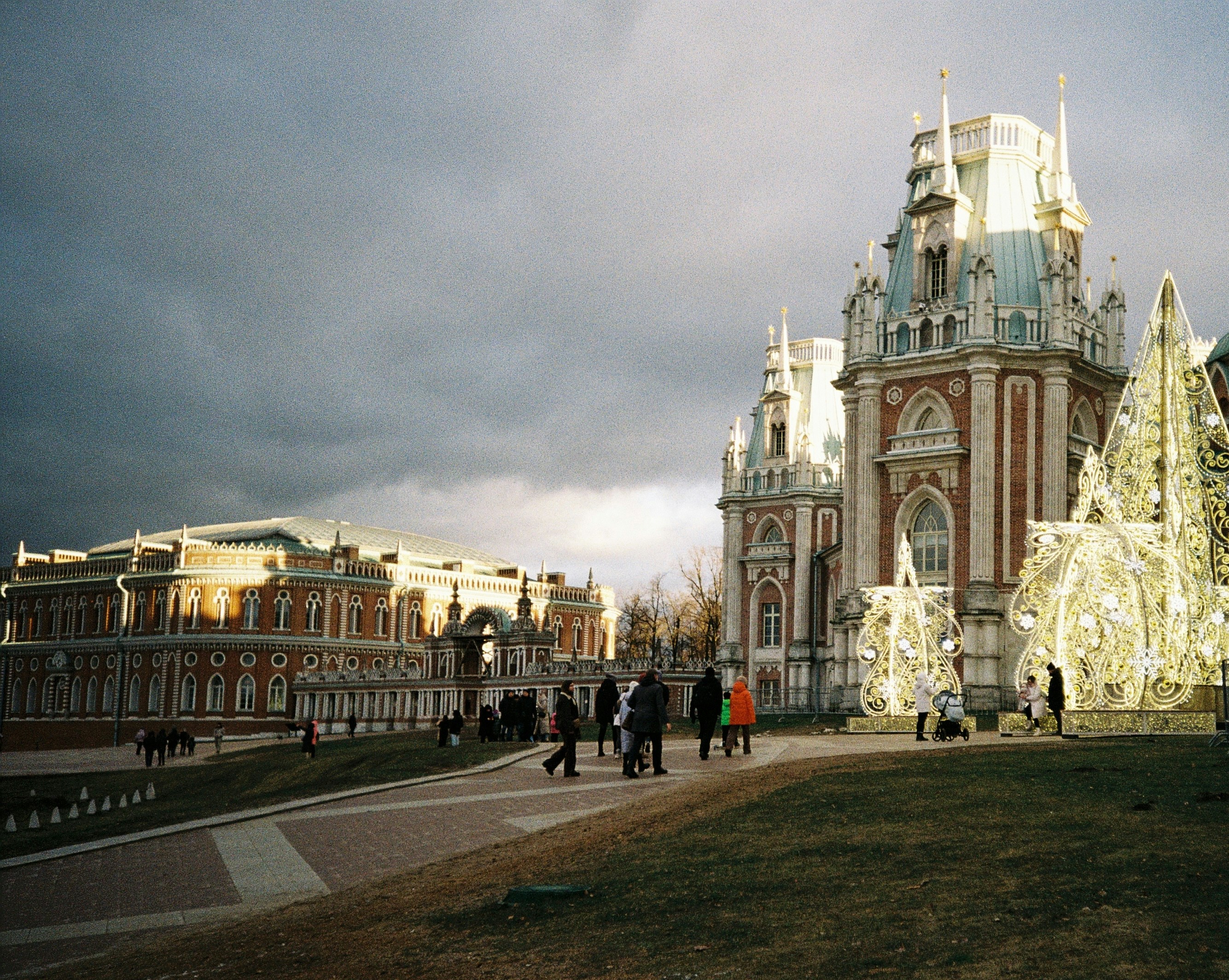 A group of people standing in front of a building