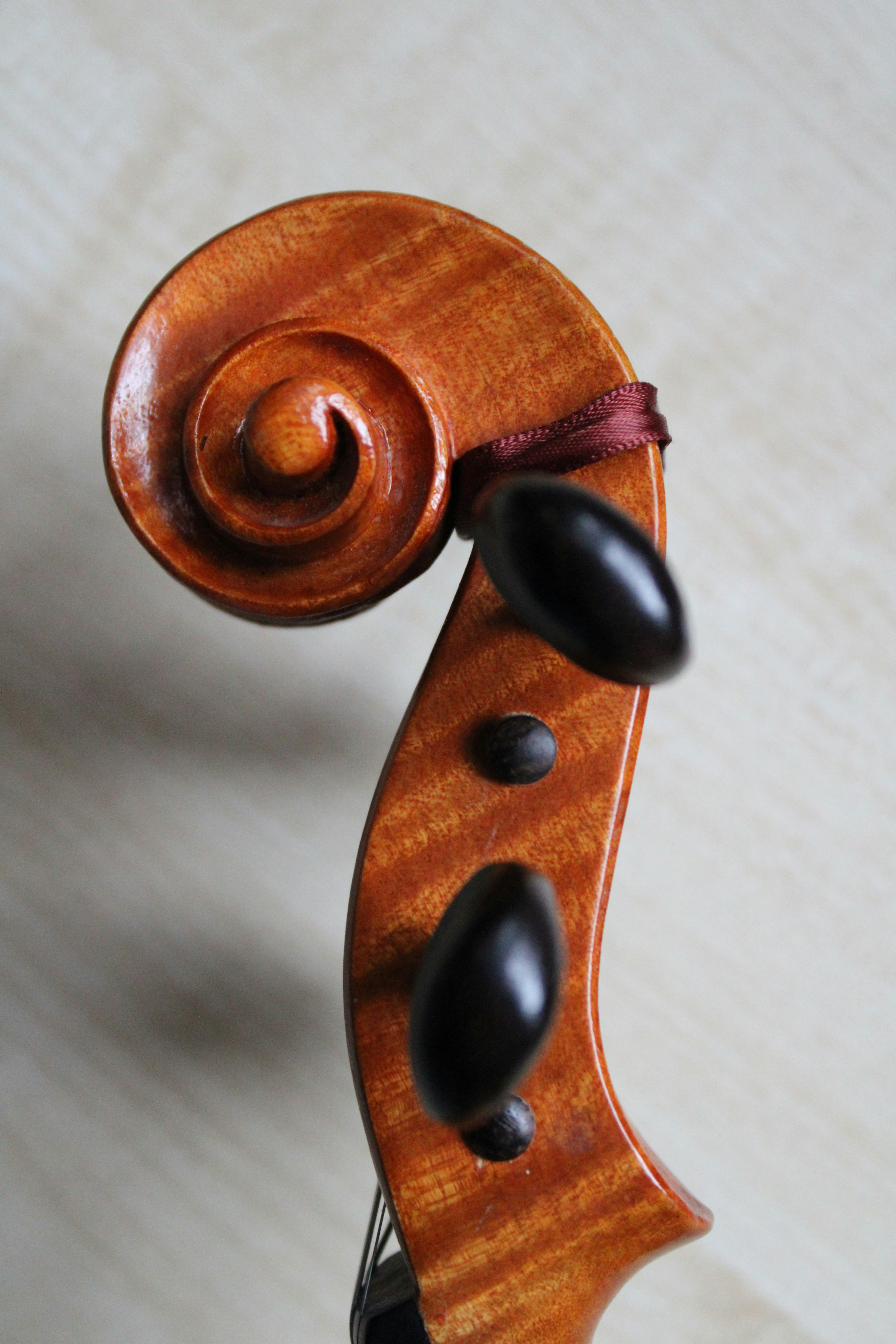 A close up of a violin on a table