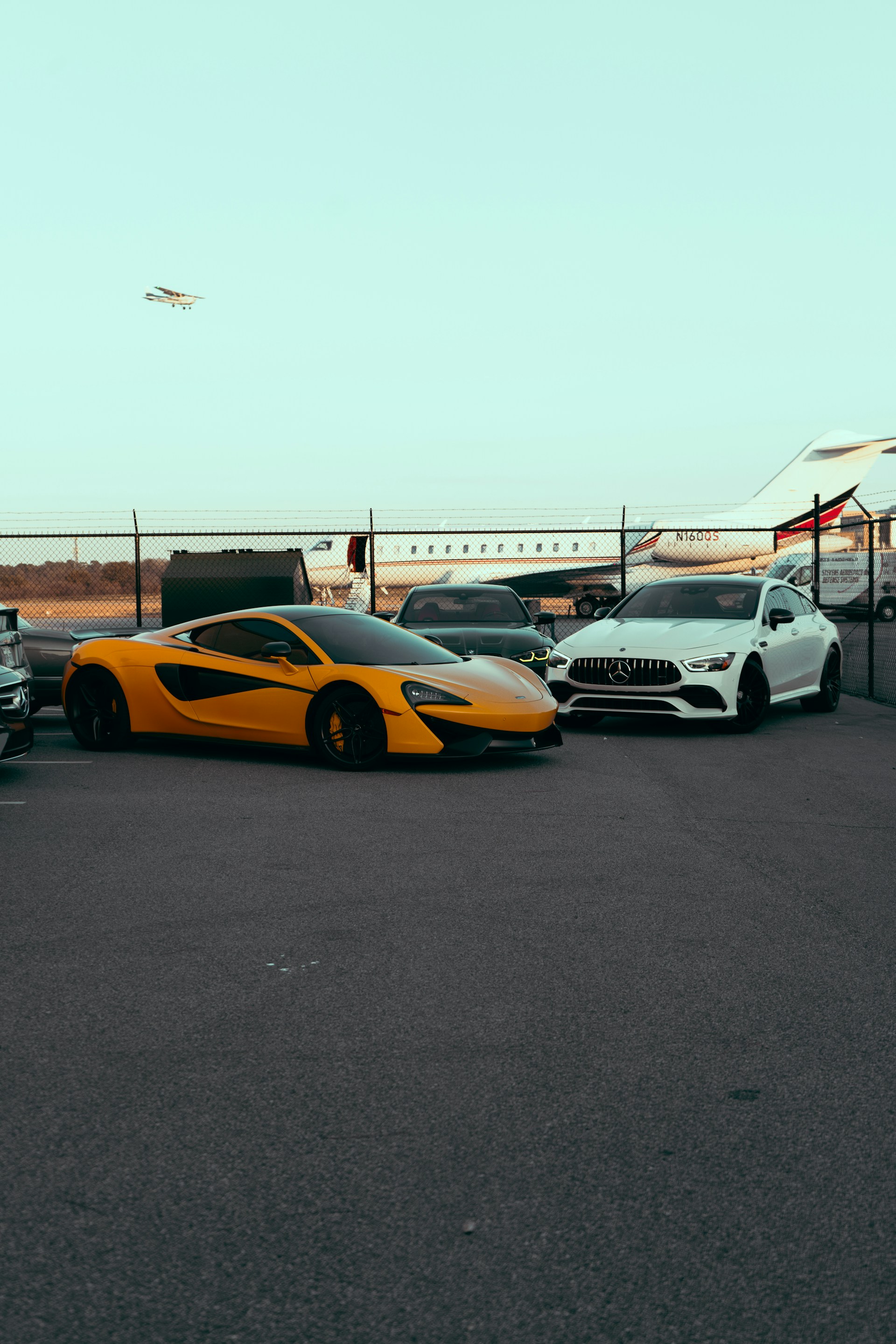 A bunch of cars parked in a parking lot