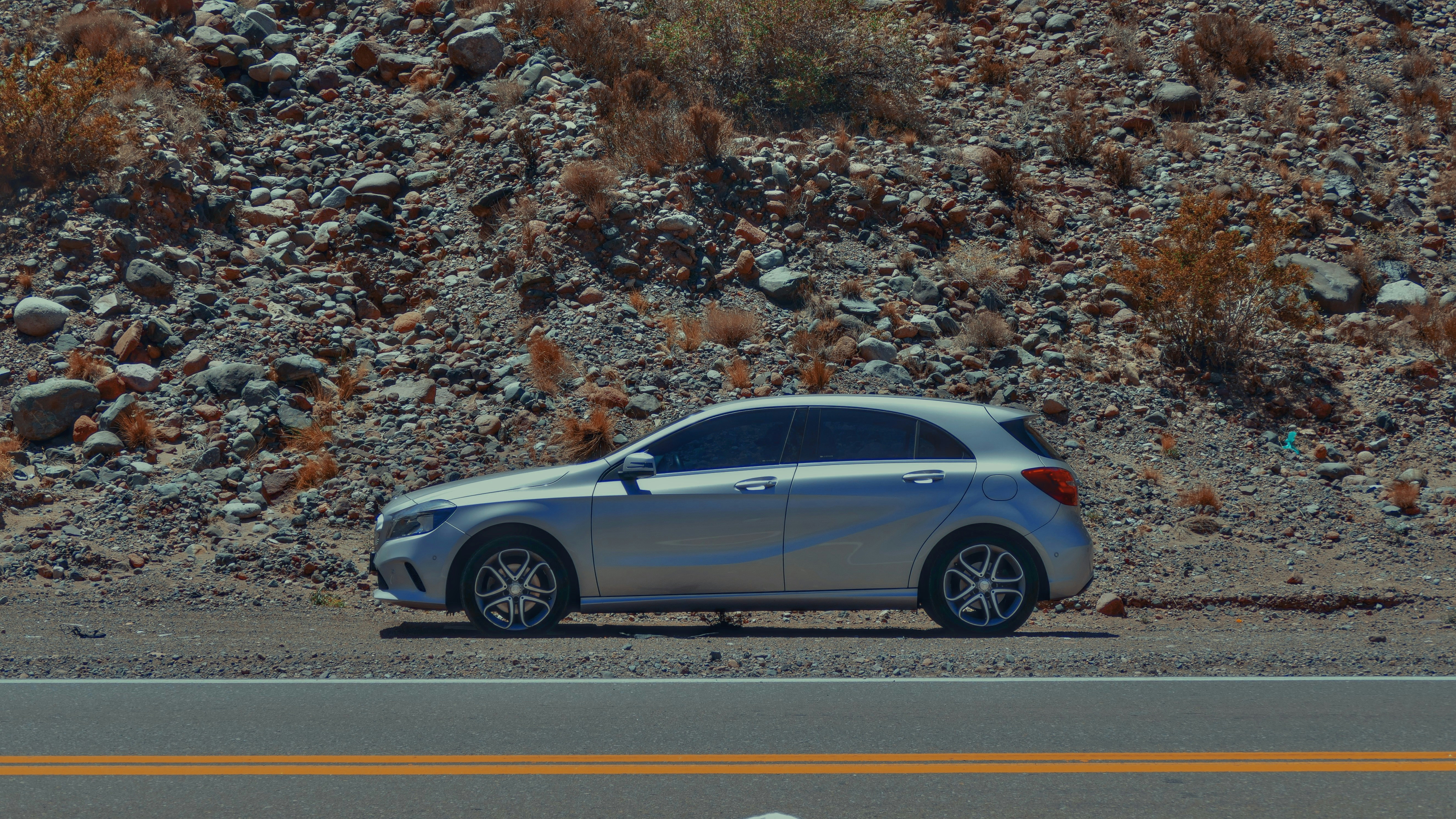 A car is parked on the side of the road