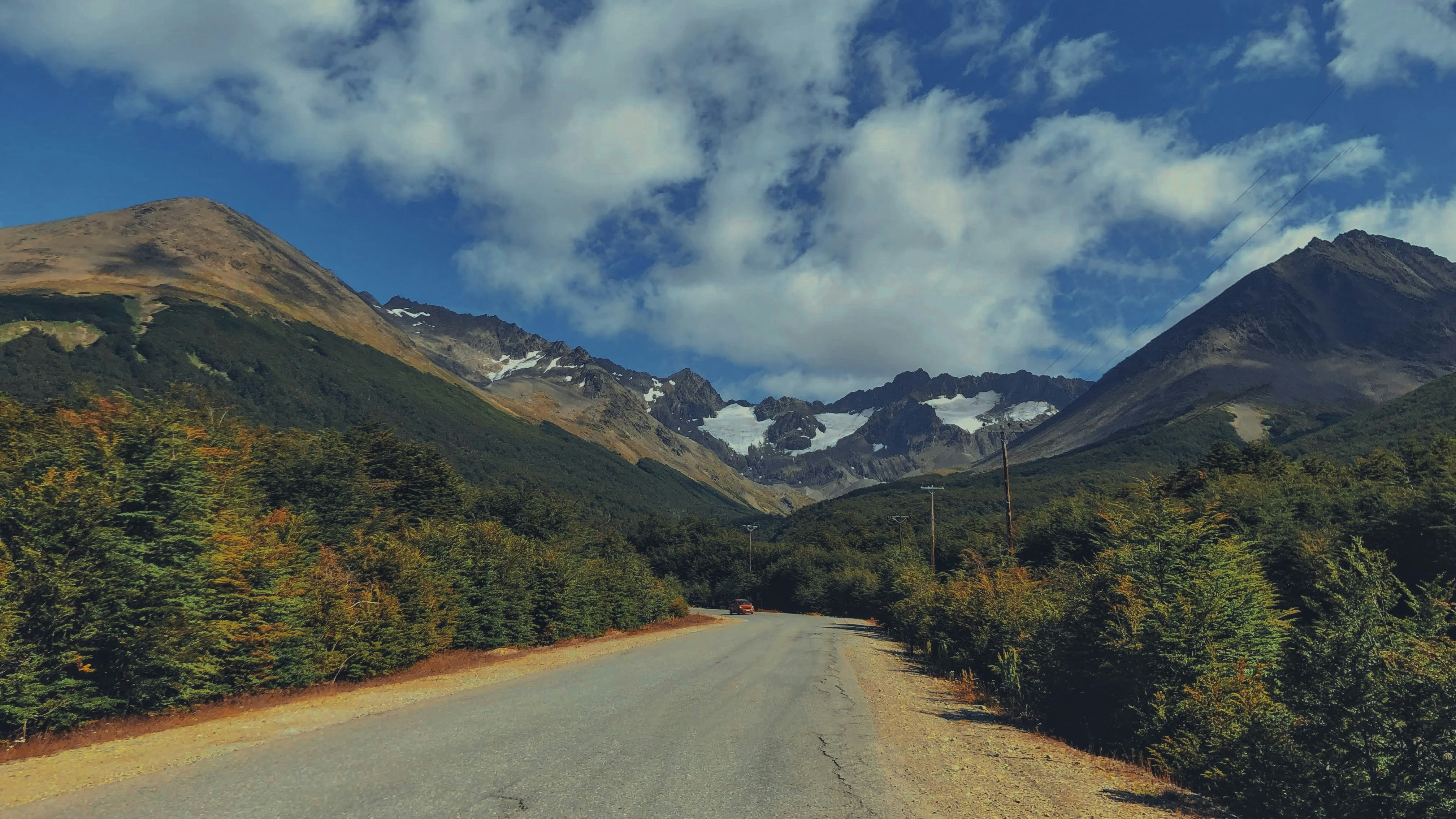 A view of a mountain road from a car