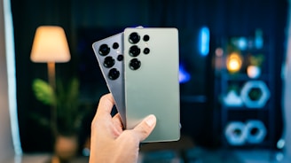 A person holding a remote control in their hand