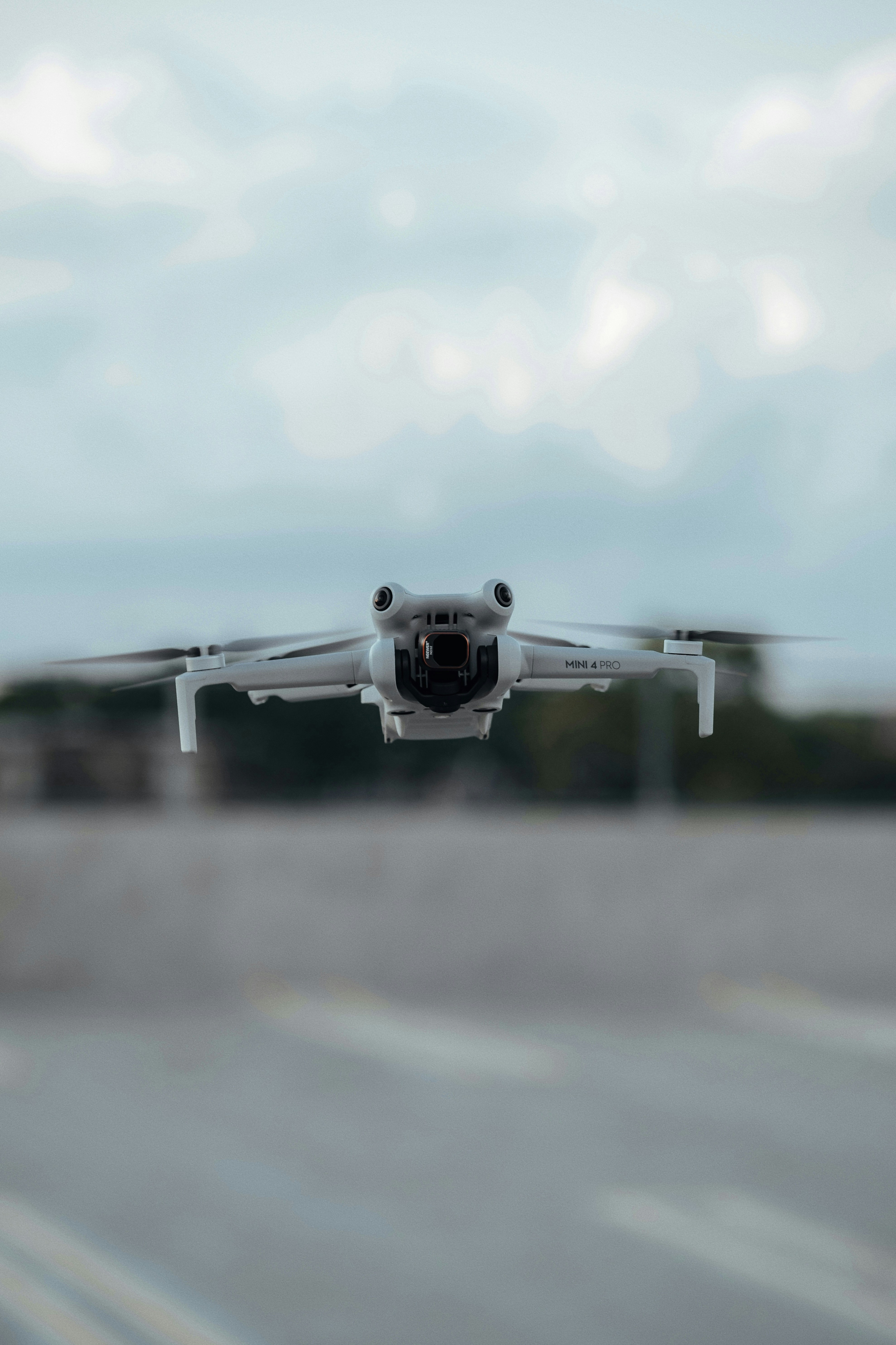 A small airplane is taking off from an airport runway