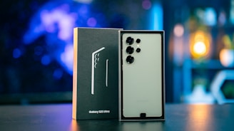 A box with a pair of ear buds in it