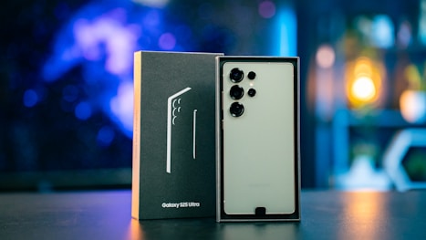 A box with a pair of ear buds in it