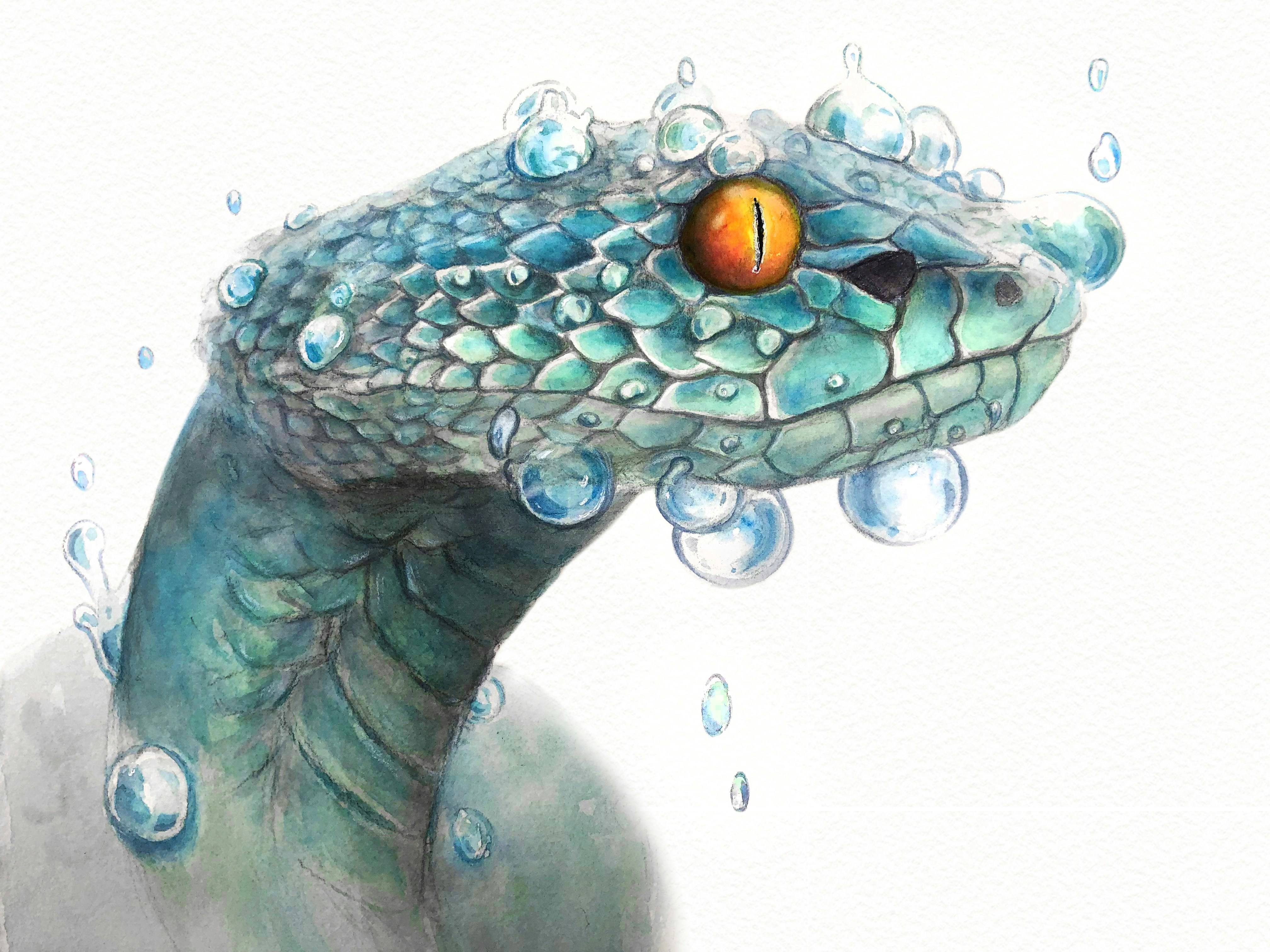 Un primer plano de una serpiente azul con burbujas