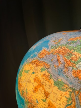 A close up of a globe with a black background