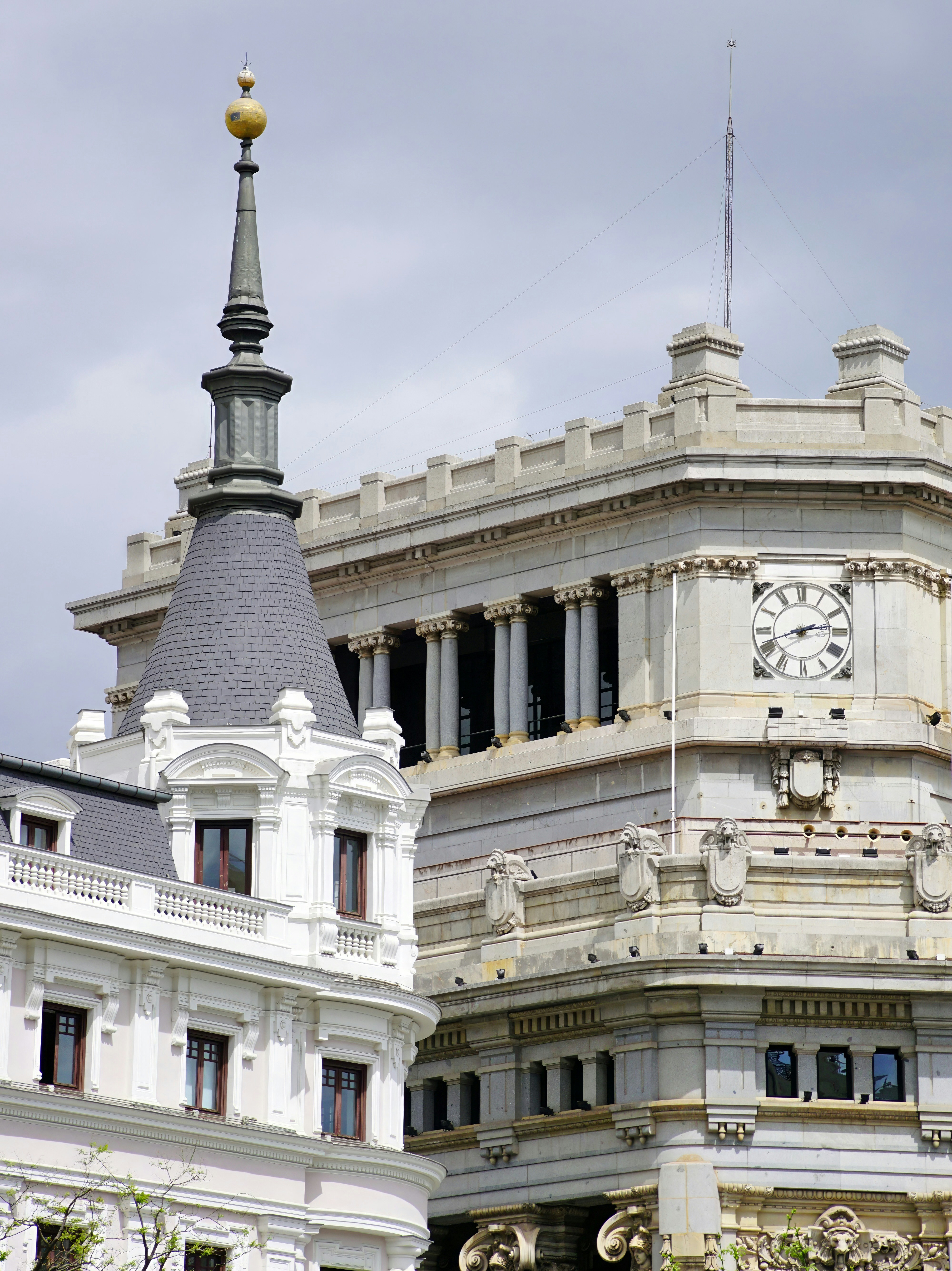 A large building with a clock on the top of it