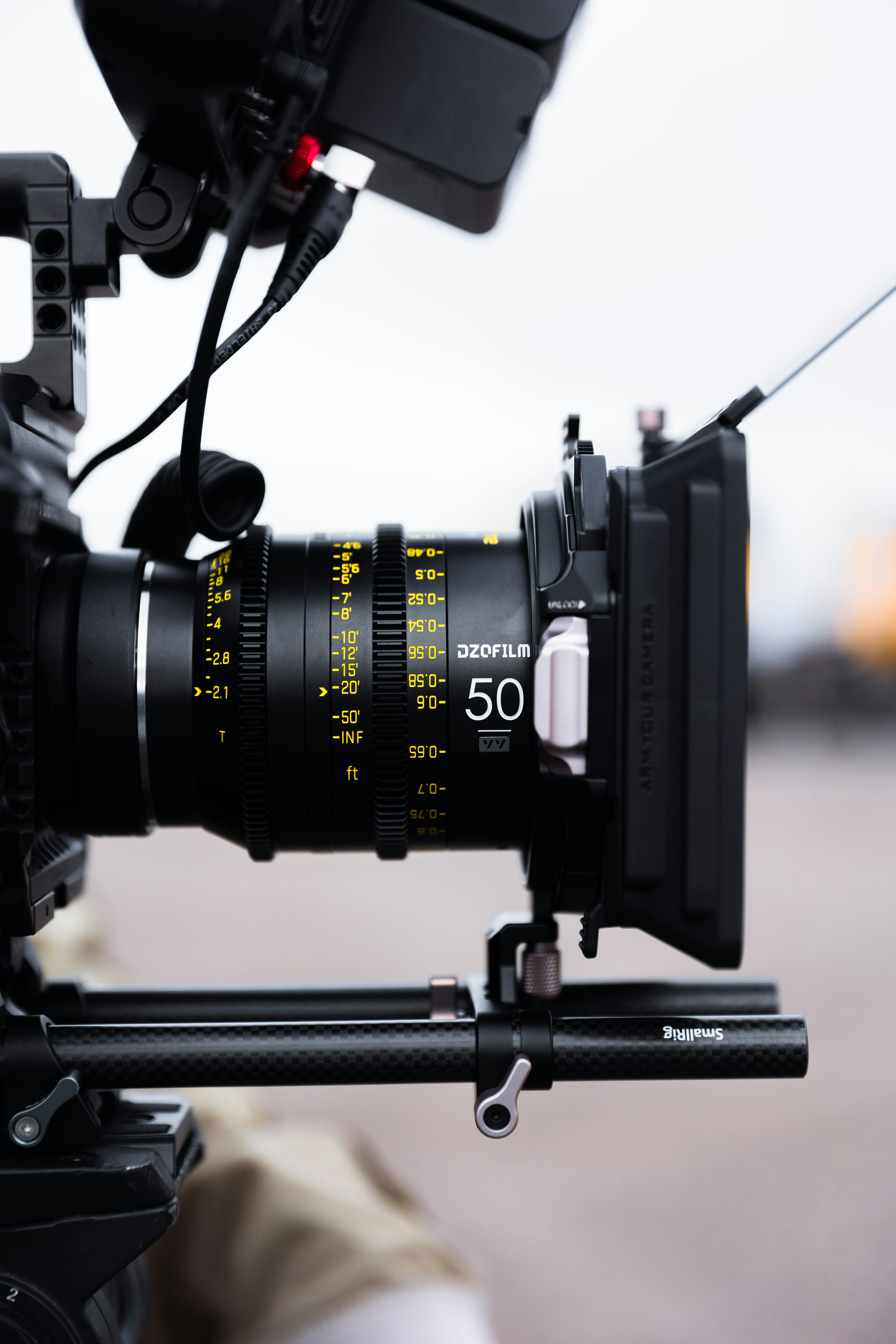 A close up of a camera on a tripod