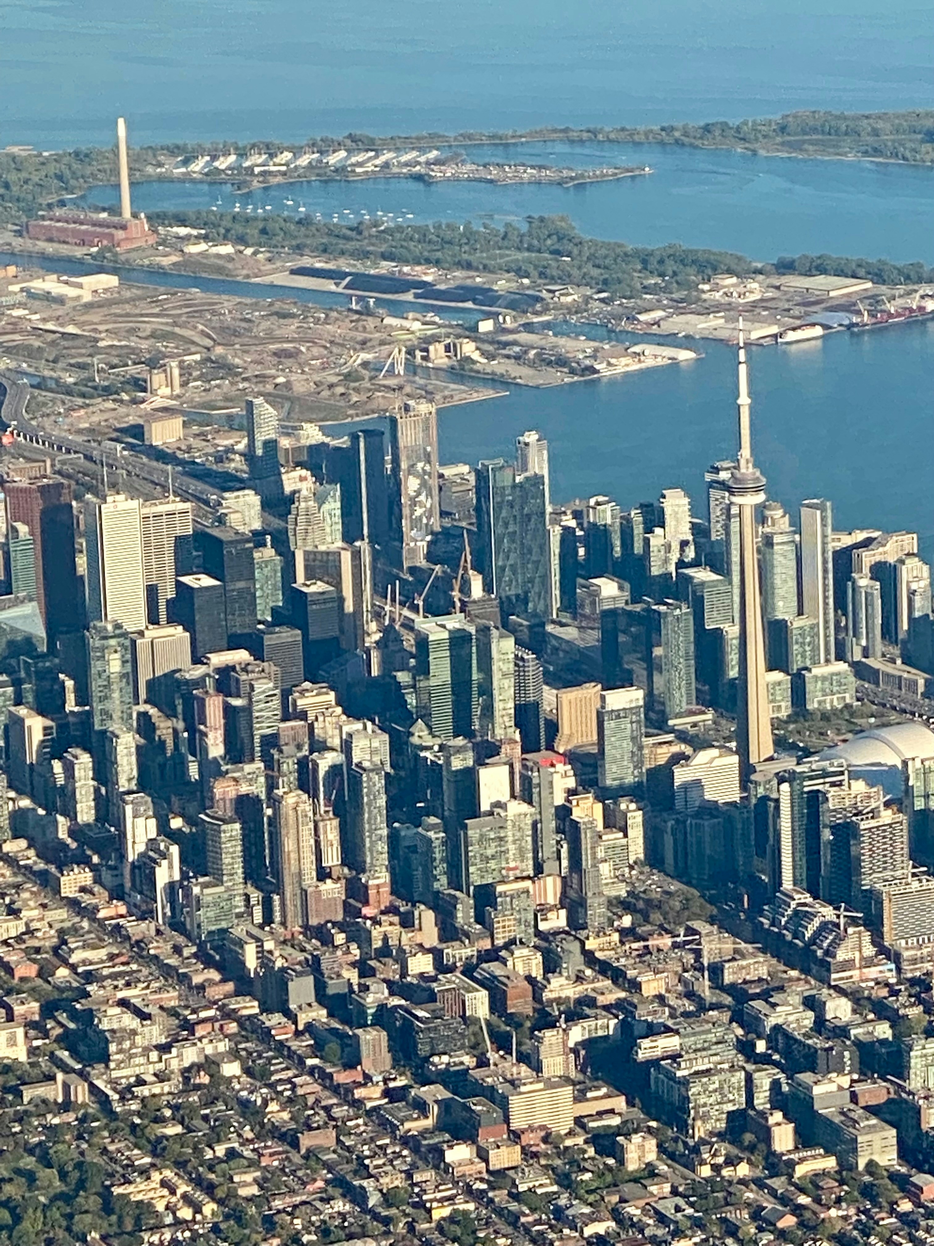 An aerial view of a large city with tall buildings