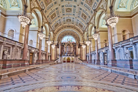 The inside of a building with a large ceiling