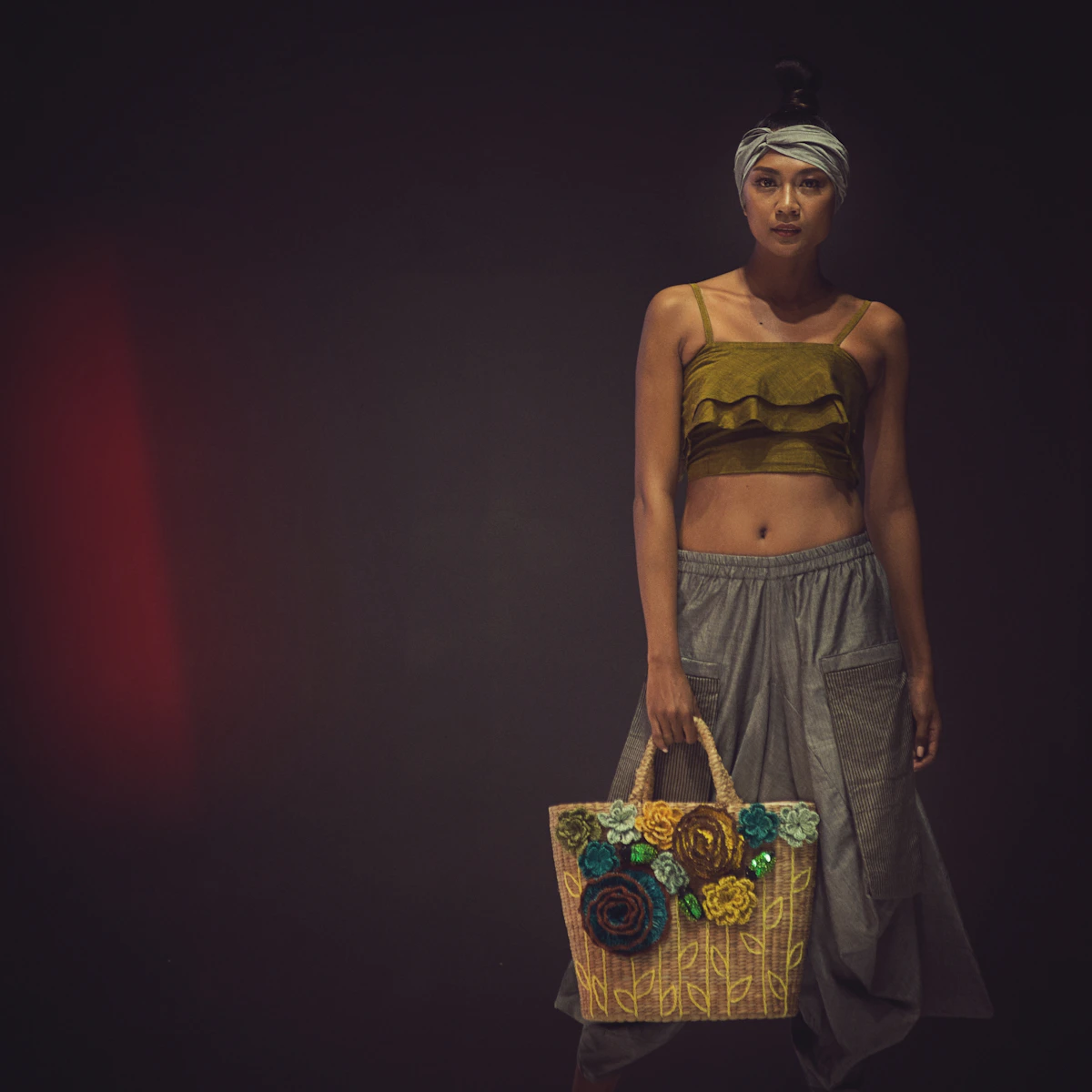 Fair-trade workshop with artisans crafting sustainable accessories from recycled fabric