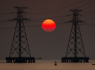 The sun is setting over a body of water