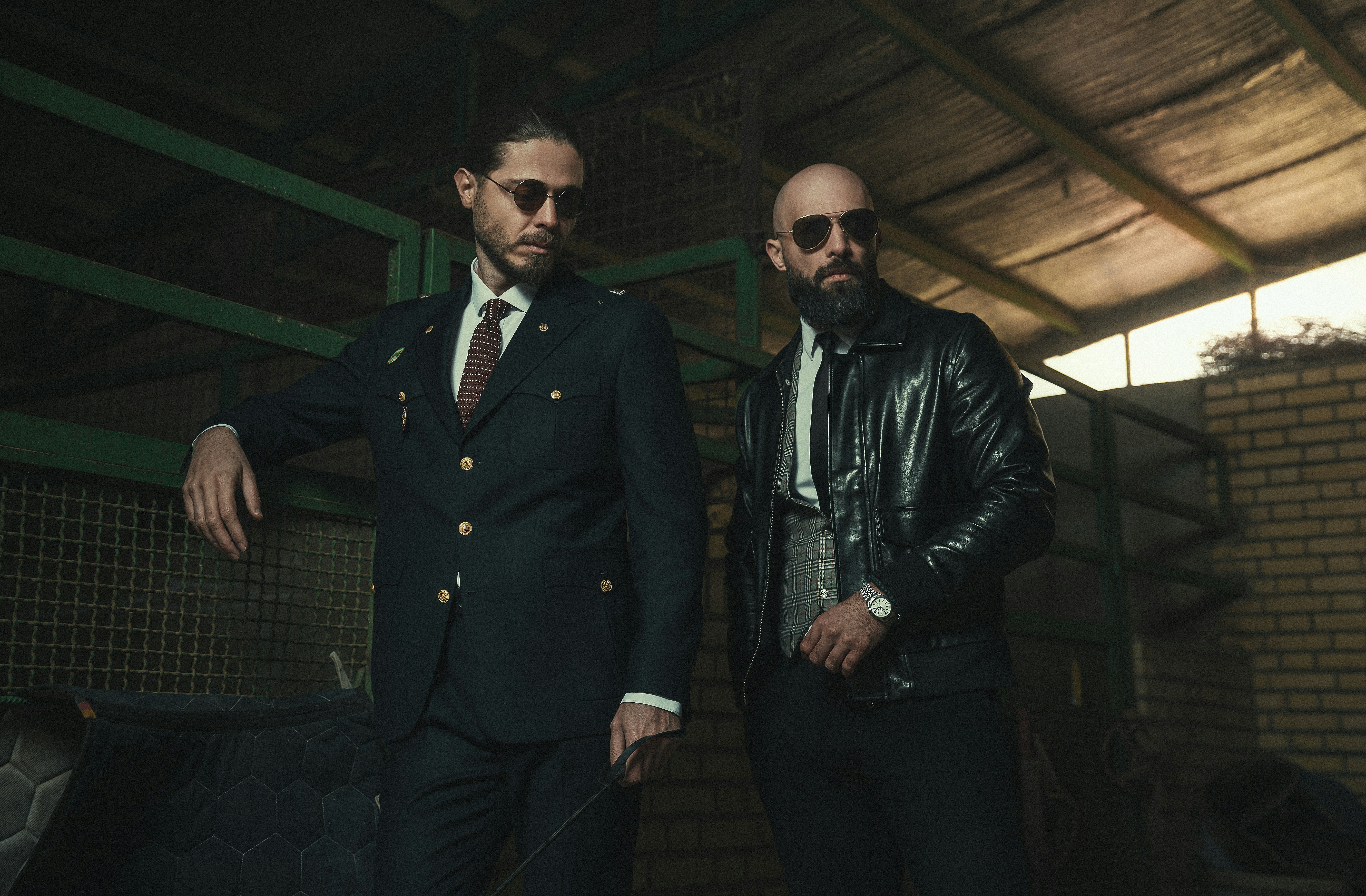 A couple of men standing next to each other