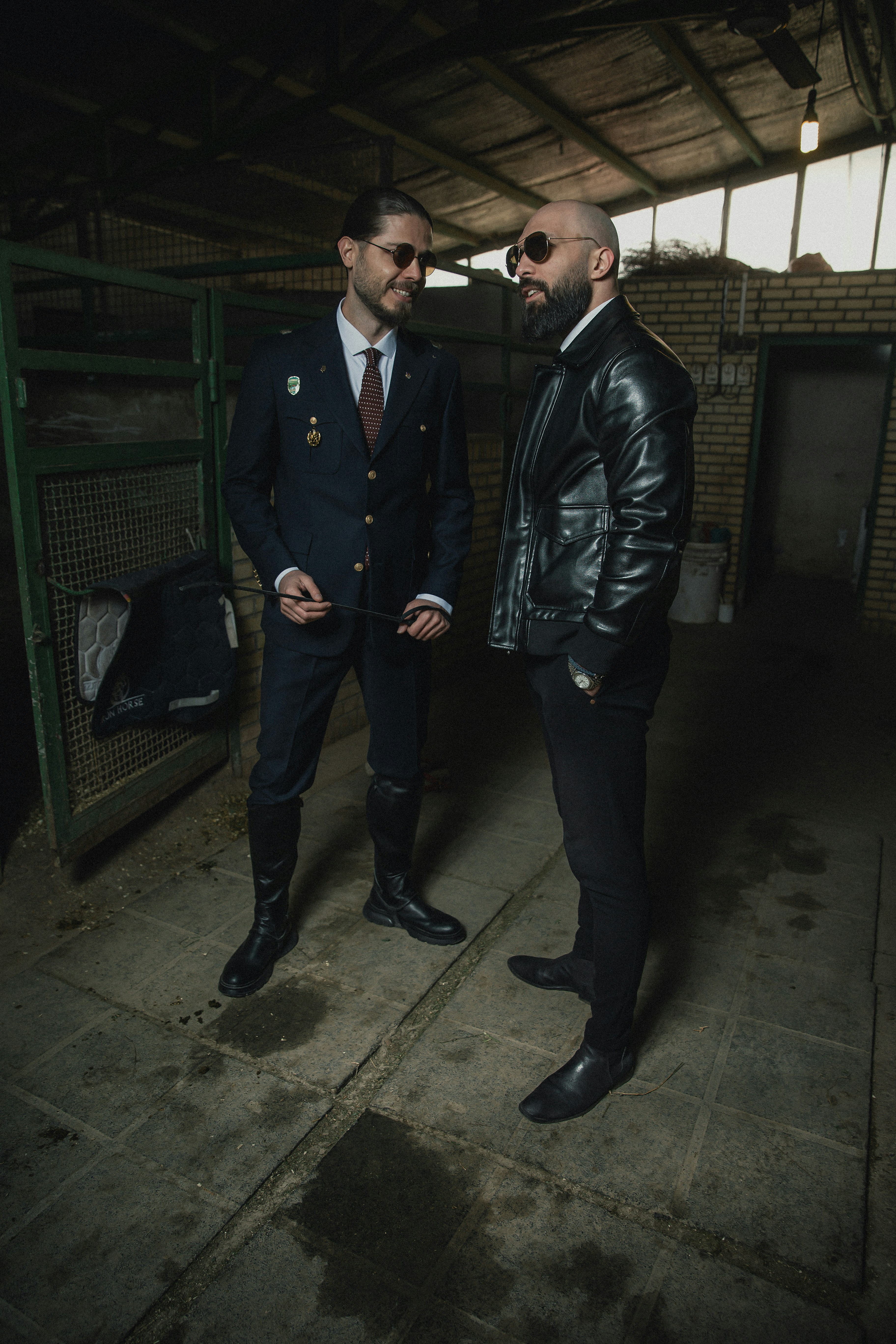 A couple of men standing next to each other