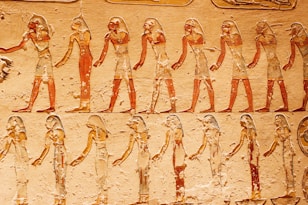 A wall with a bunch of pictures on it