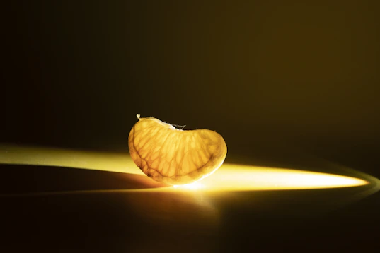 A piece of fruit that is sitting on a table