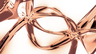 A close up of a metal object on a white background