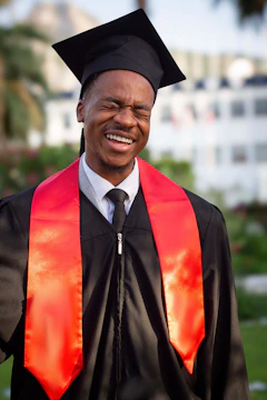 A man in a graduation cap and gown