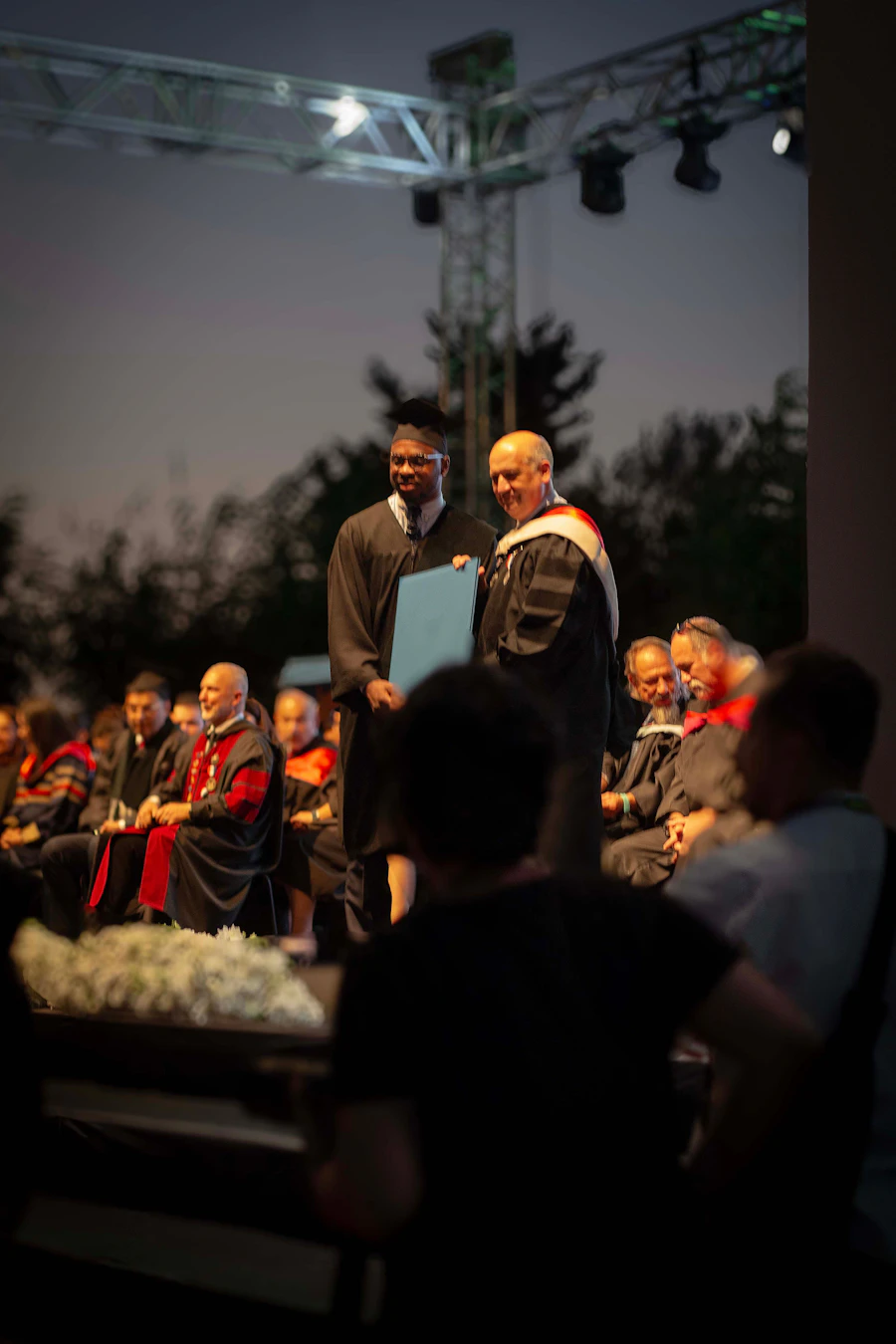 Representatives standing on stage at an award ceremony