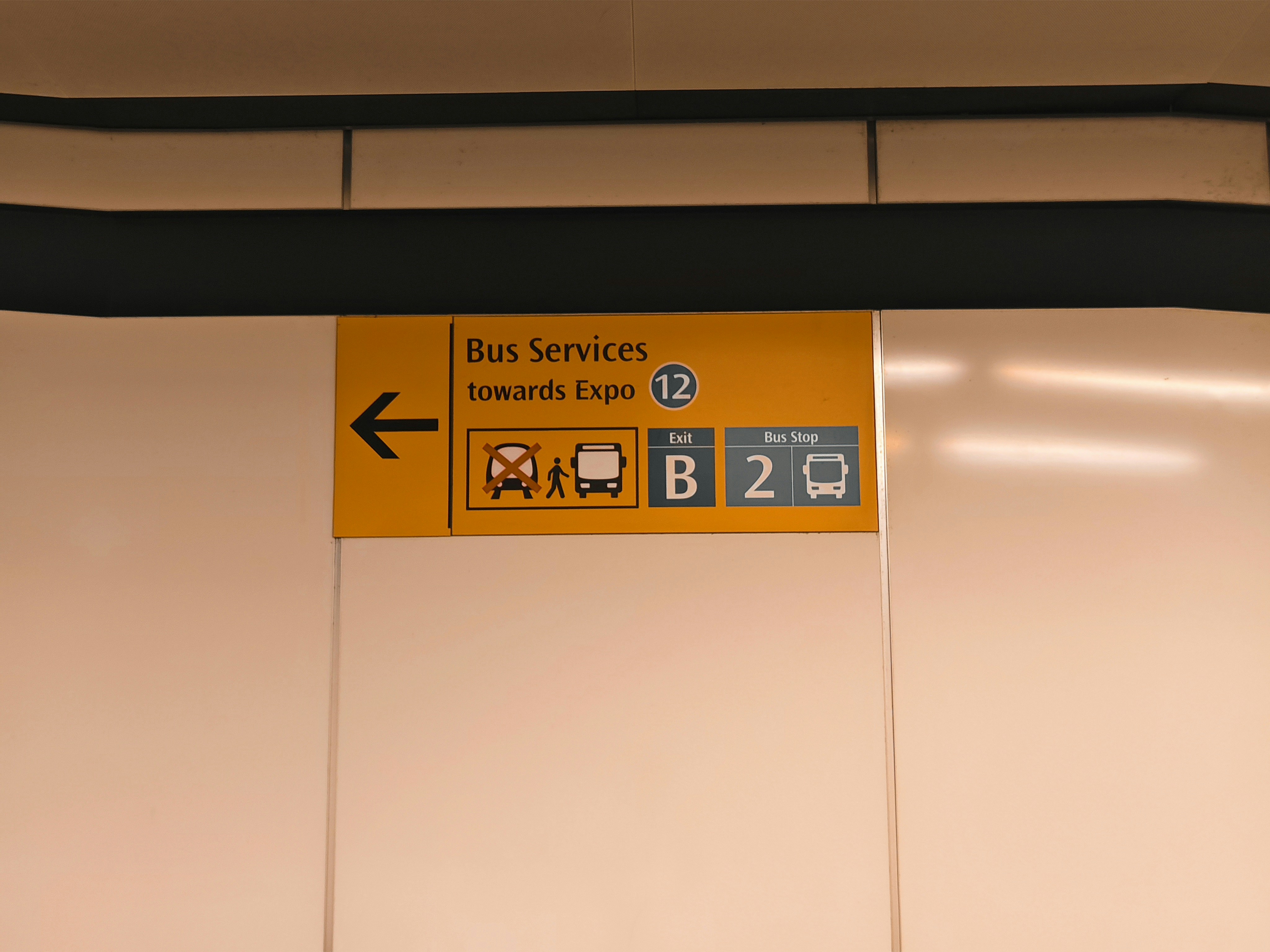 A close up of a sign on a wall photo – Free Bus stop Image on Unsplash