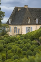 A house with a garden in front of it