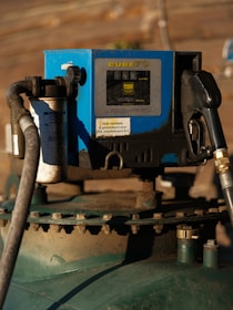 A gas pump with a hose connected to it