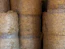 A bunch of hay rolls stacked on top of each other