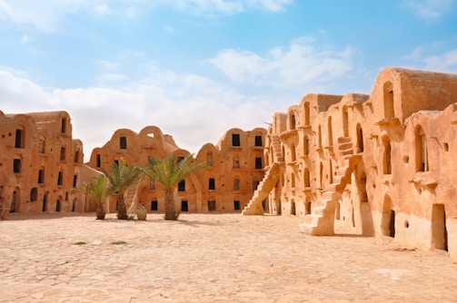 A group of adobe buildings in the desert