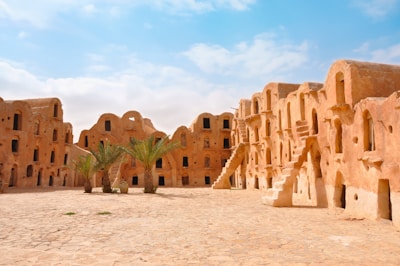 A group of adobe buildings in the desert