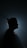 A silhouette of a person in the dark