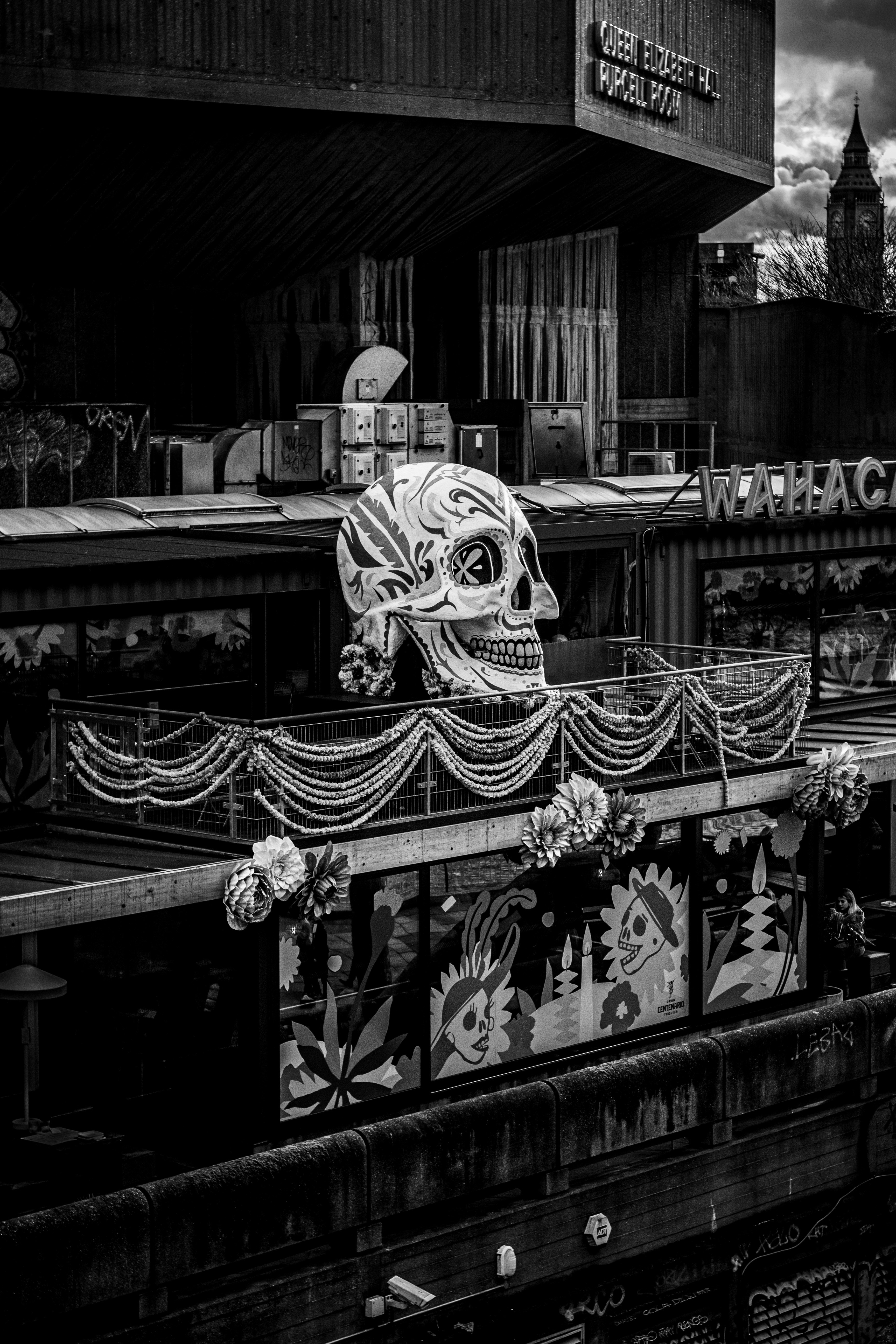 A black and white photo of a train station