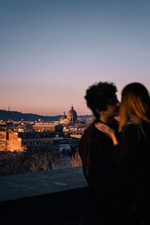 A man and a woman standing next to each other