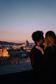 A man and a woman standing next to each other