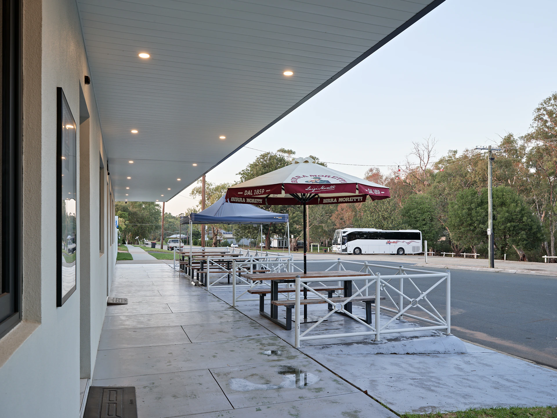 A row of tables sitting on the side of a building