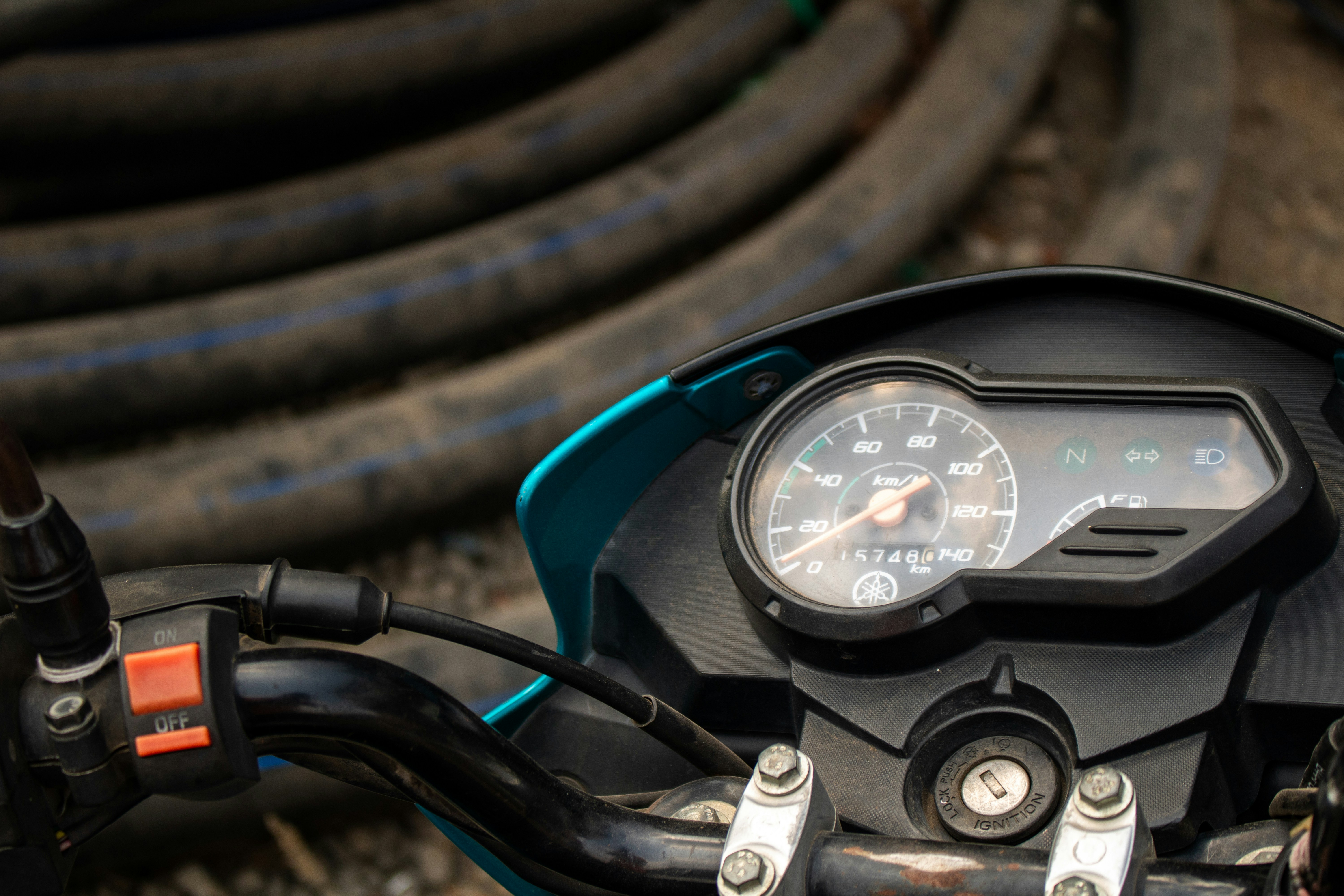 A close up of a motorcycle with a speedometer
