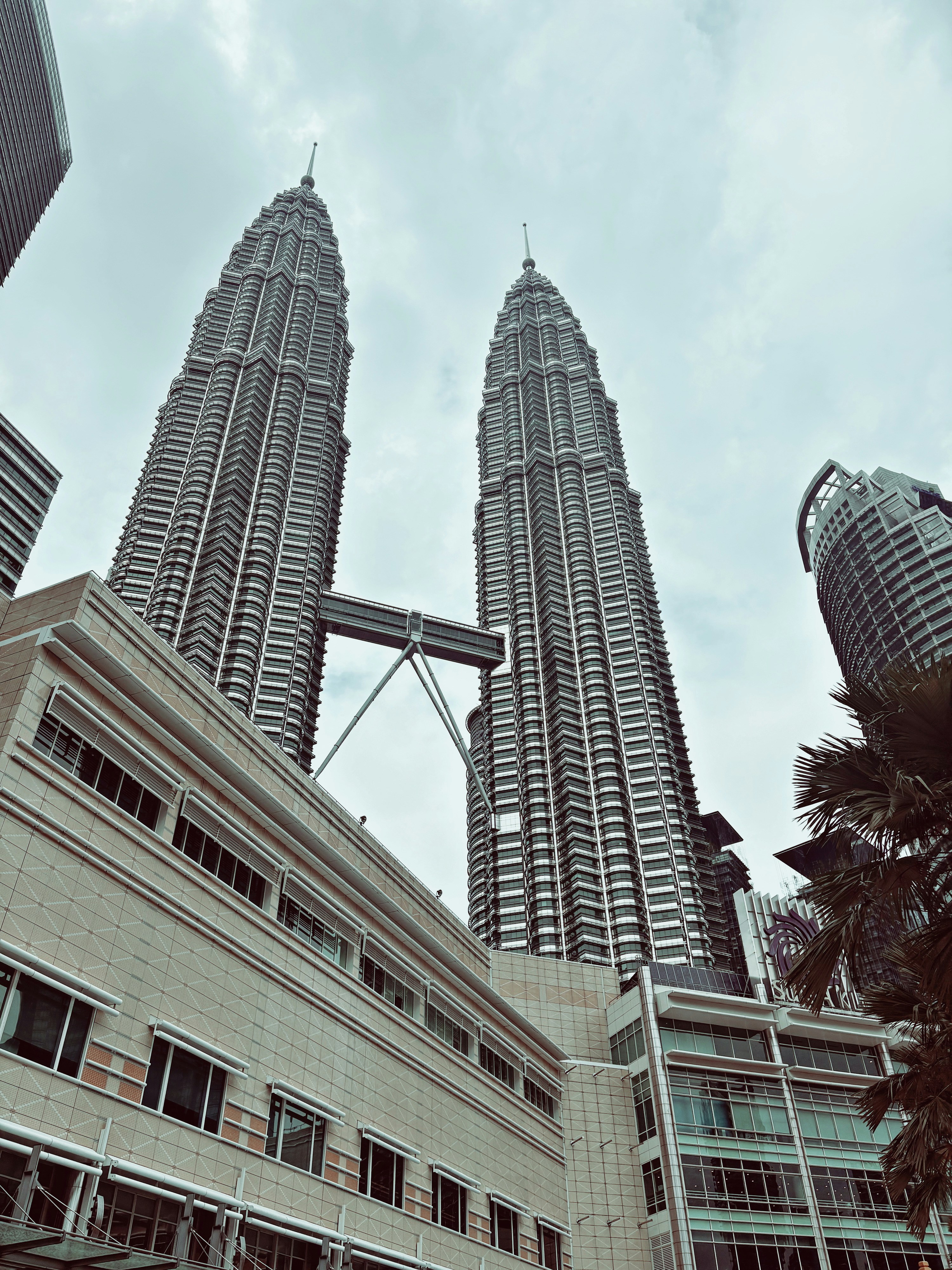 A couple of tall buildings sitting next to each other