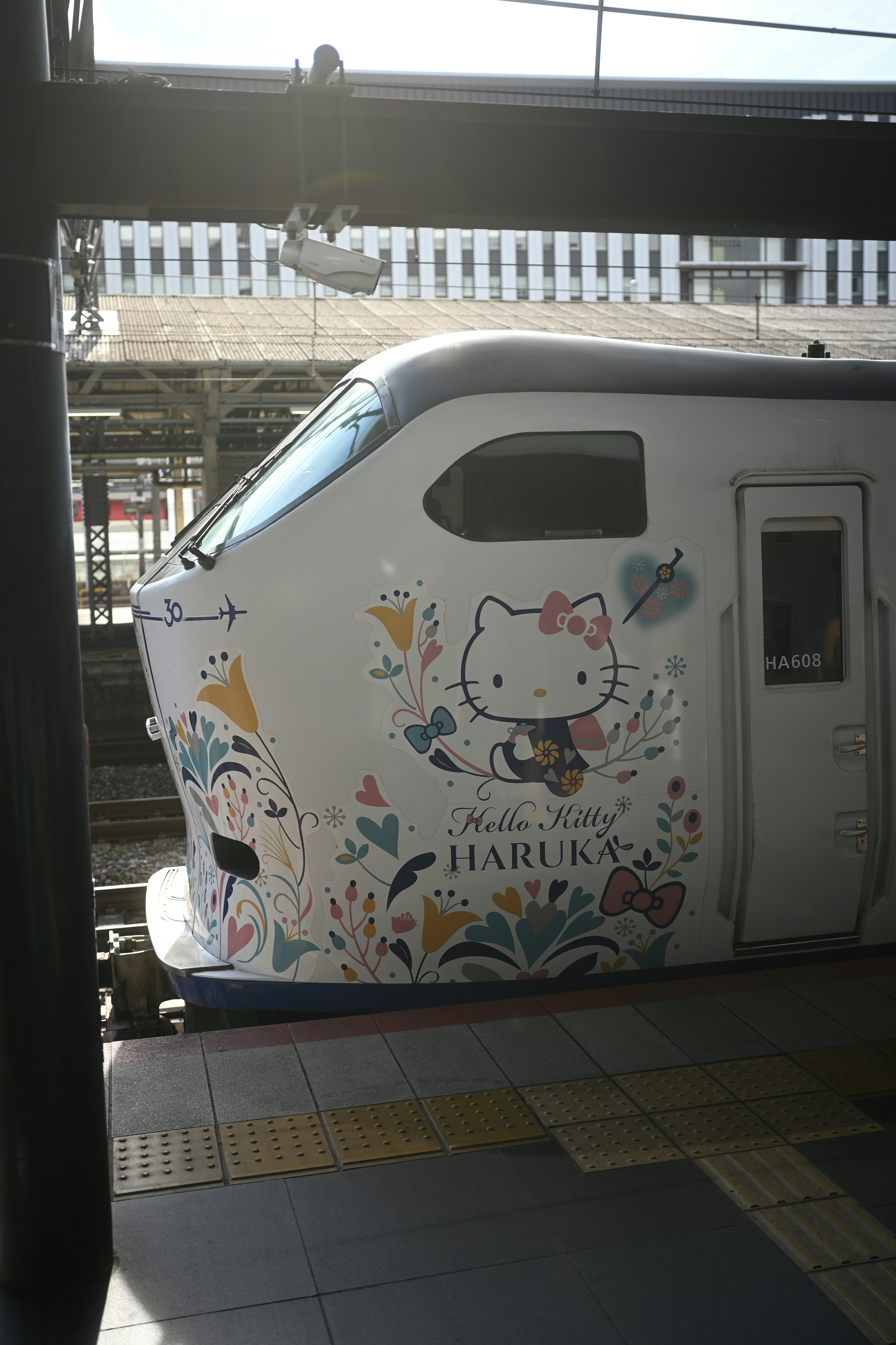 A train with a hello kitty painted on the side of it photo – Free Car ...