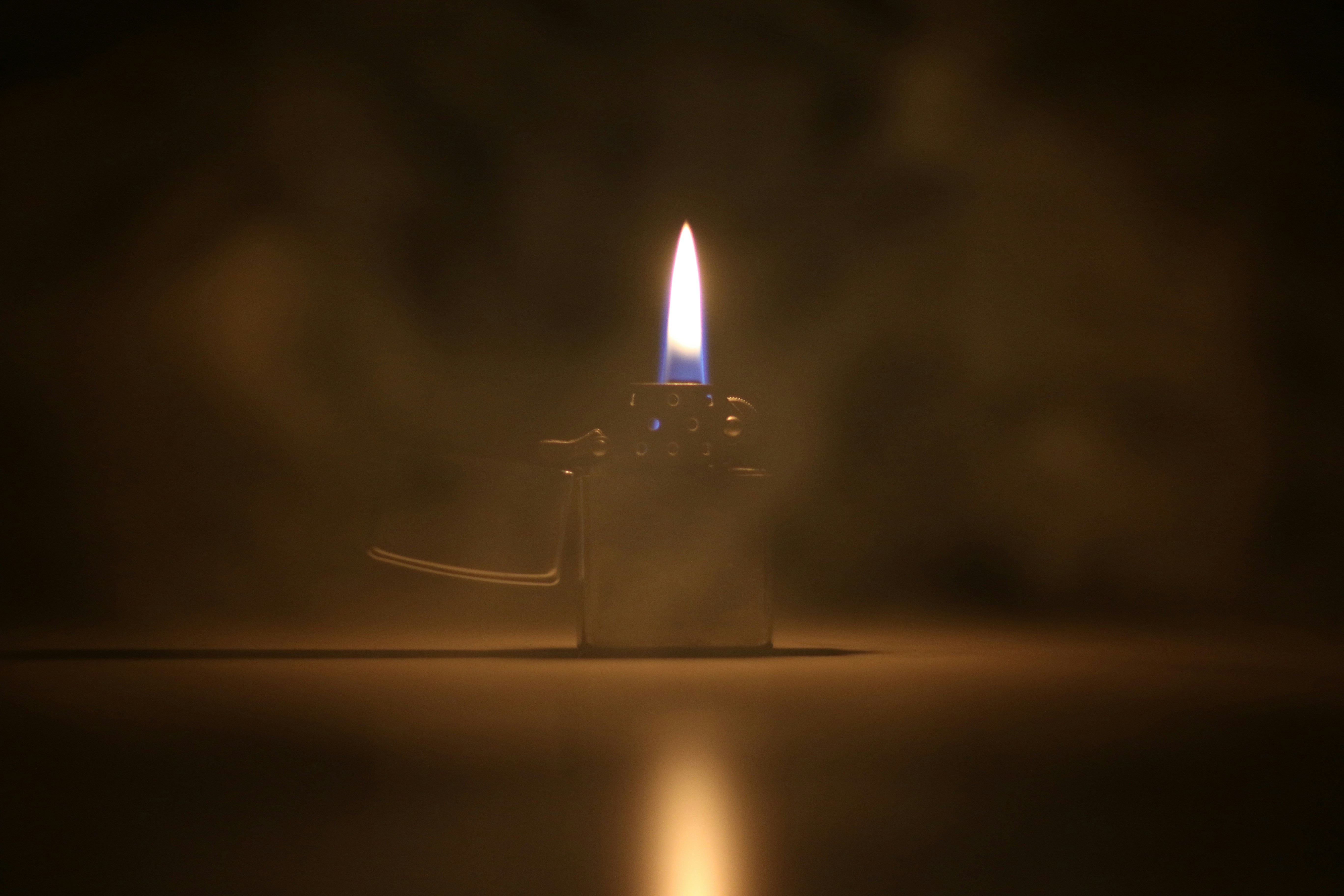 person wearing grey knit sweater