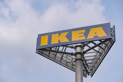 A blue and yellow sign that says ikea
