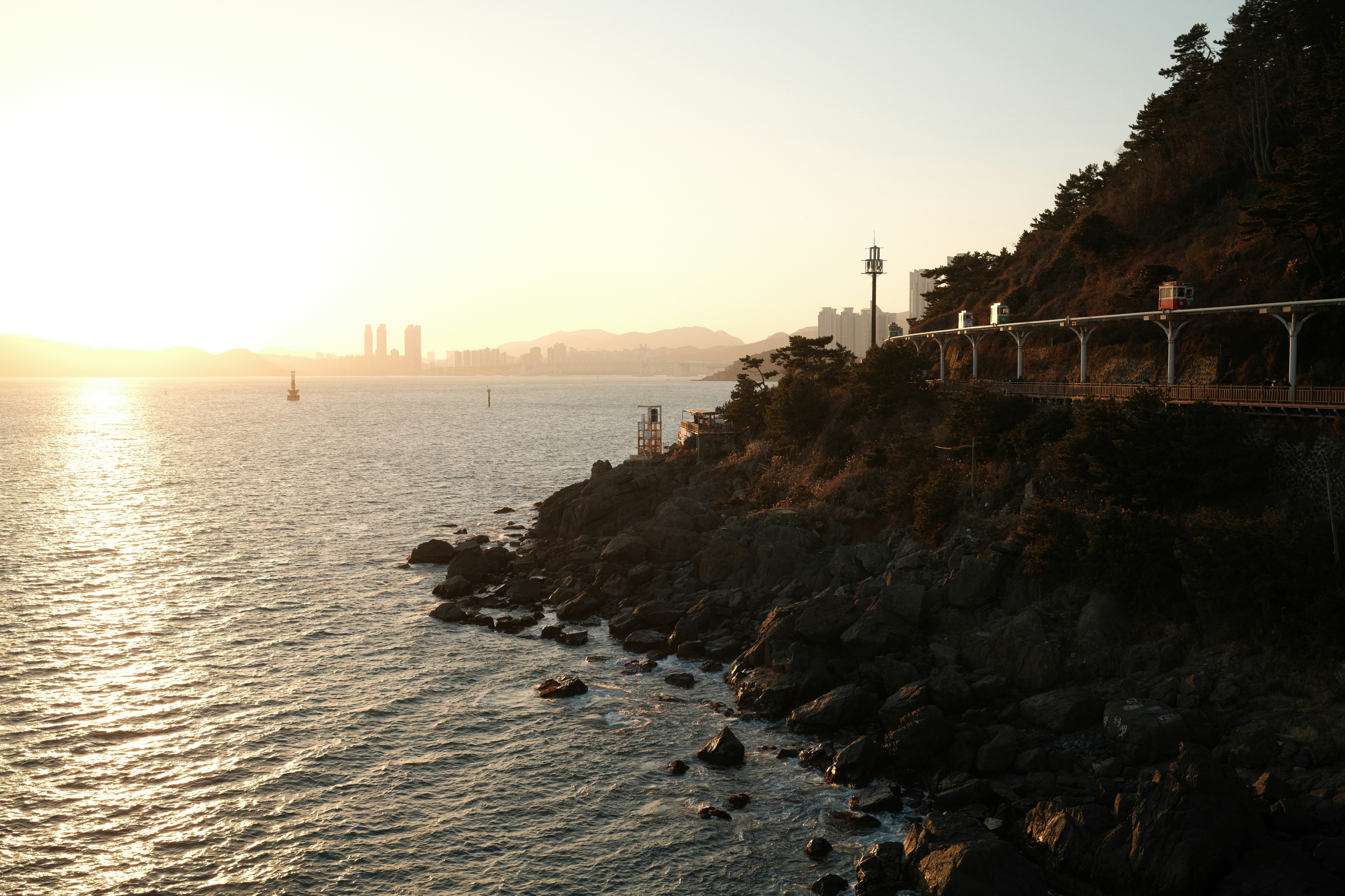 The sun is setting over a body of water