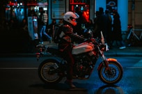 A person riding a motorcycle on a city street