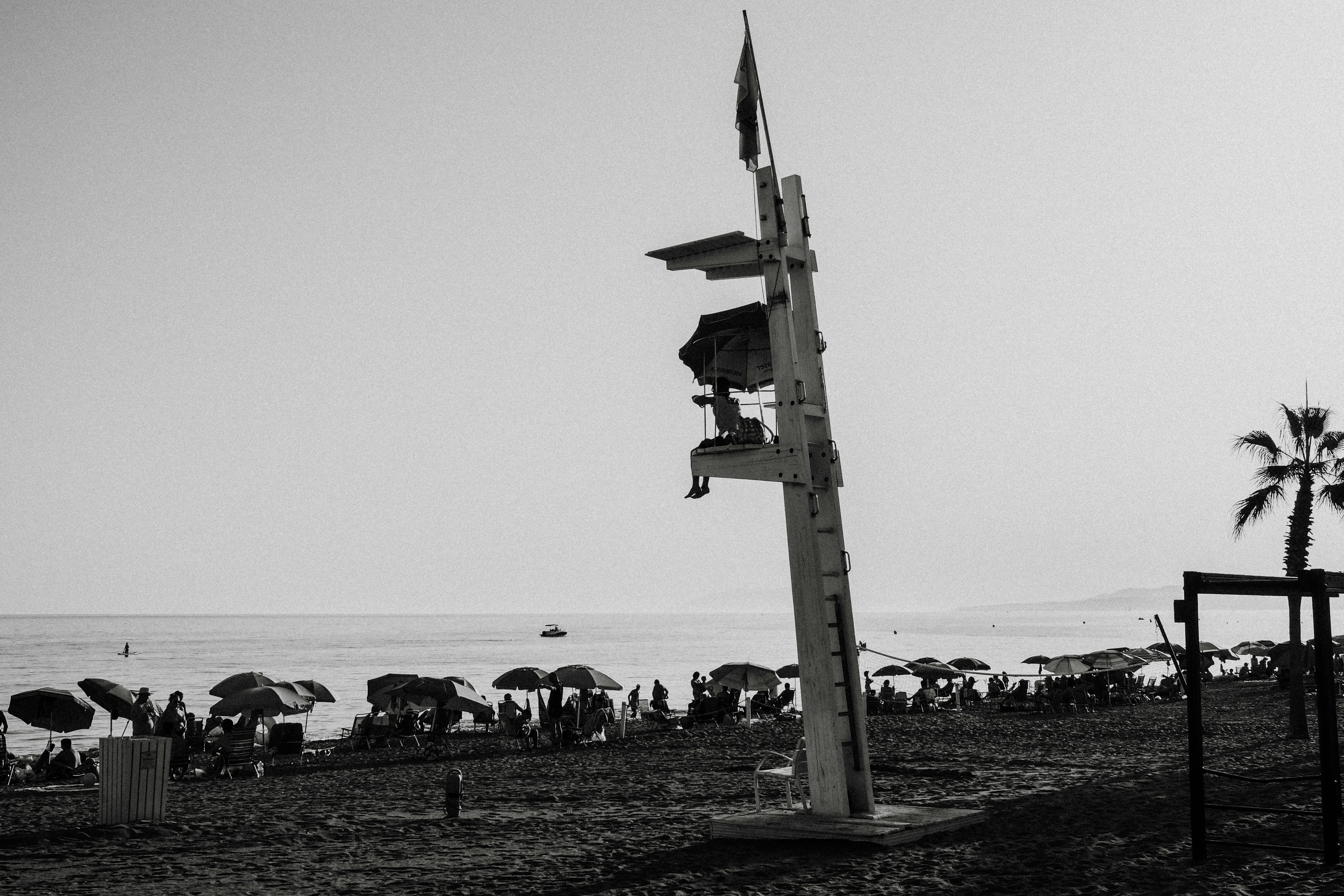 A black and white photo of a beach