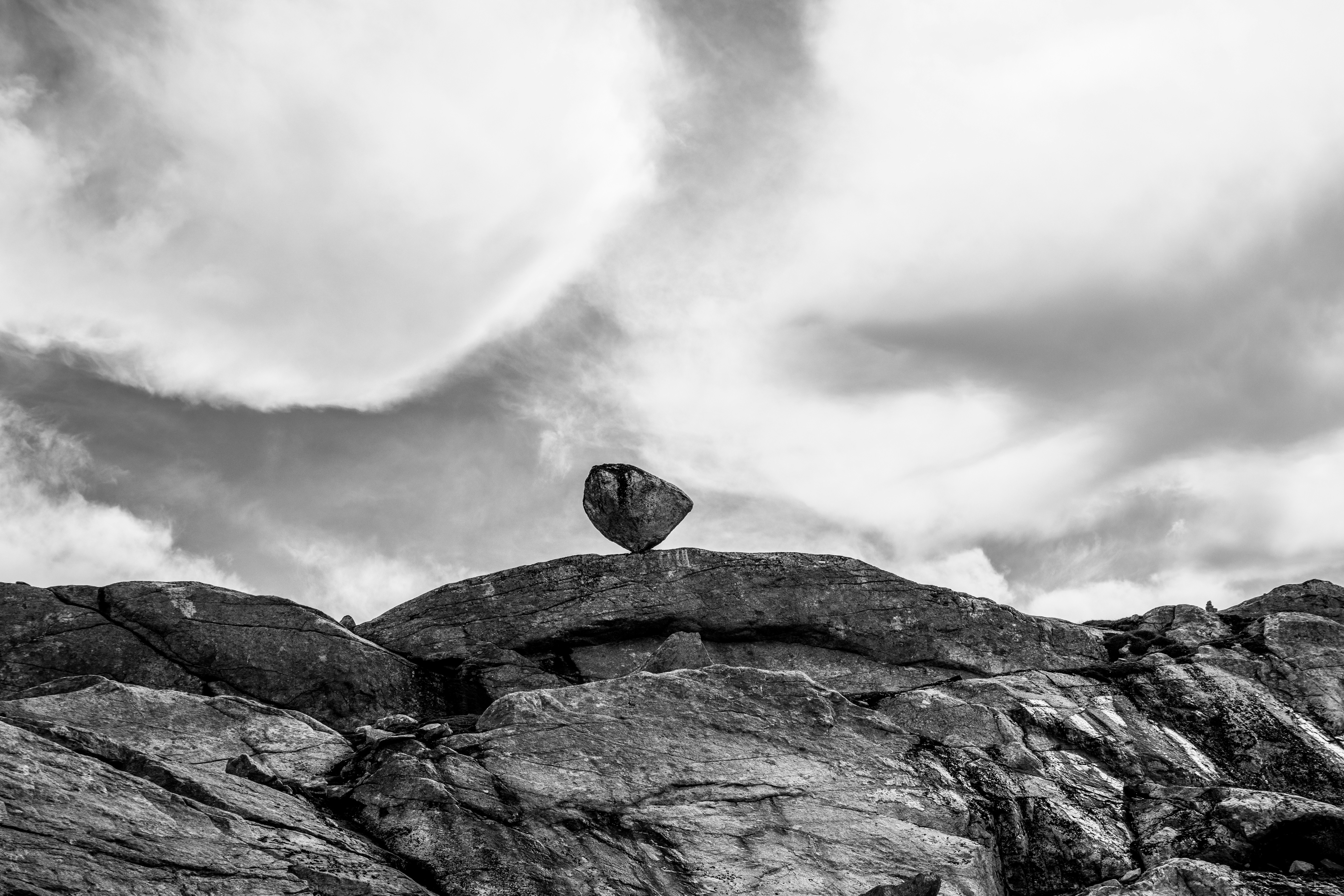 A black and white photo of a rock formation