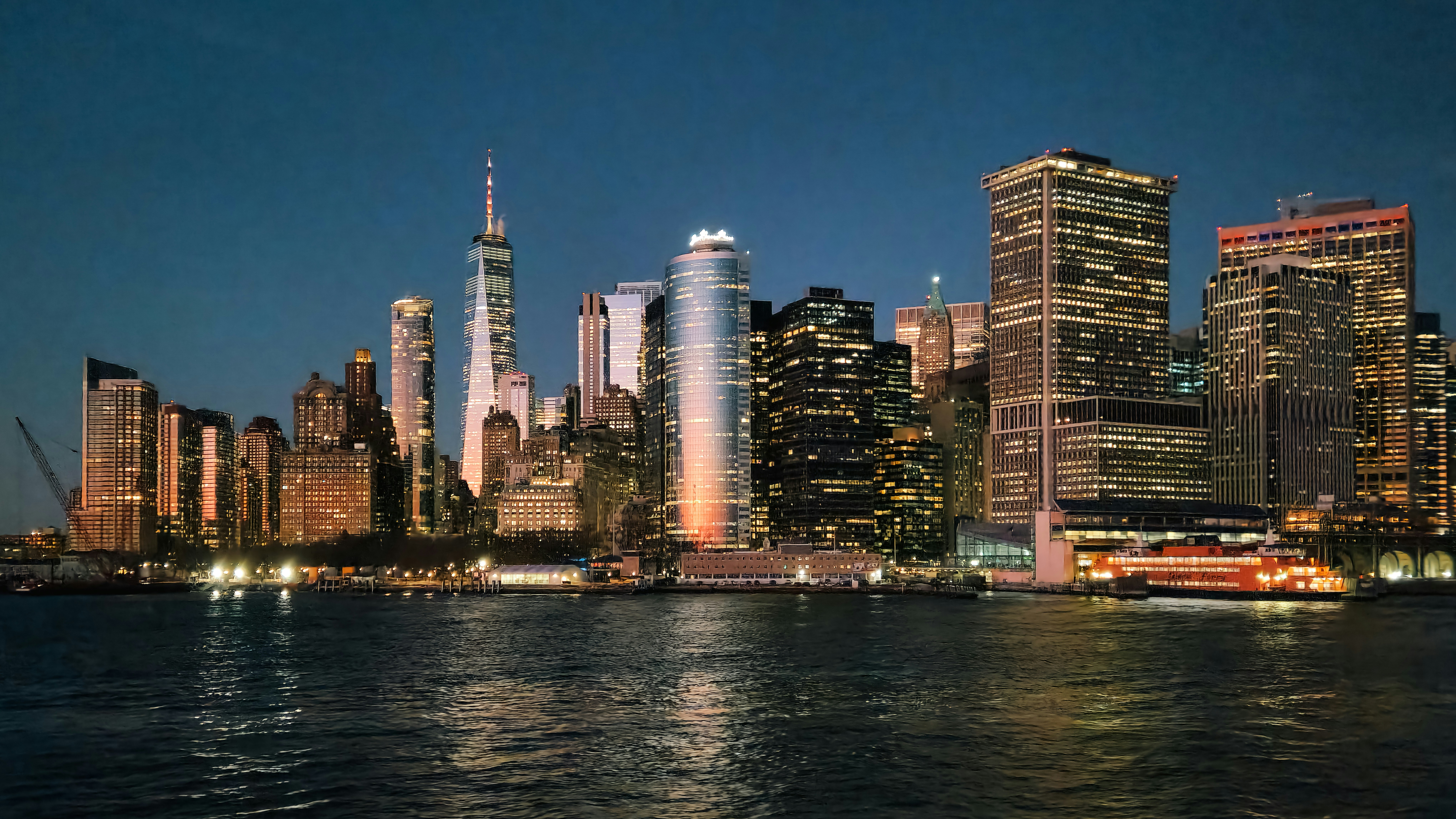 New York City skyline at night viewed from across the water