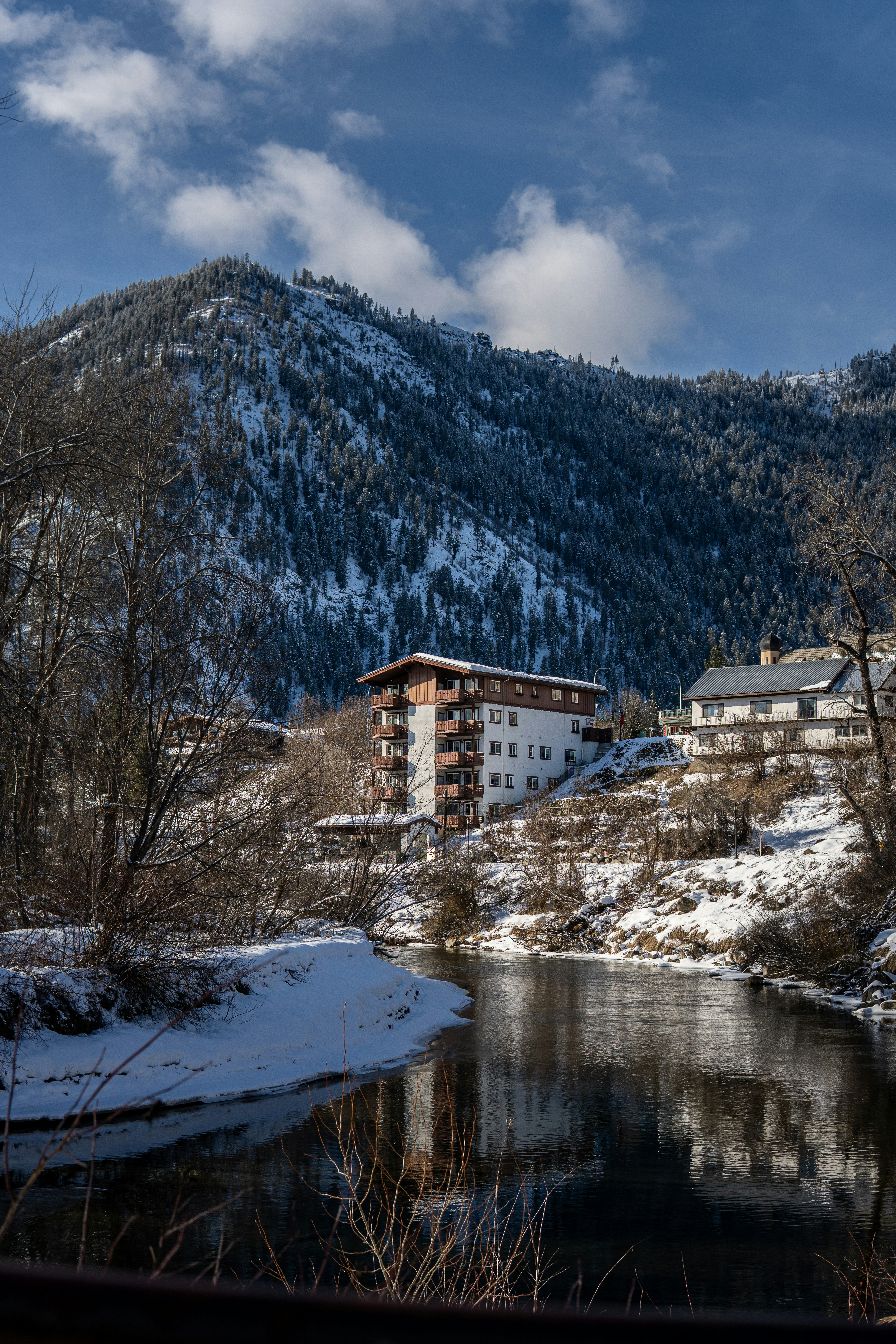 Snow-covered river and forest scenery near Leavenworth, Washington