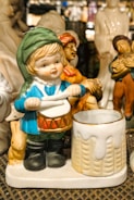 A group of figurines sitting on top of a table